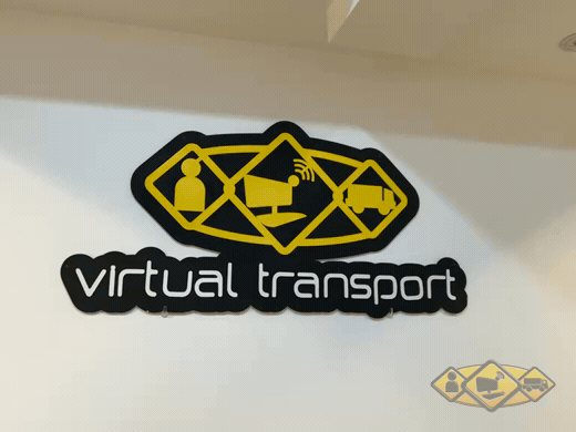 Sala de juntas de Virtual Transport con recorrido visual del logotipo